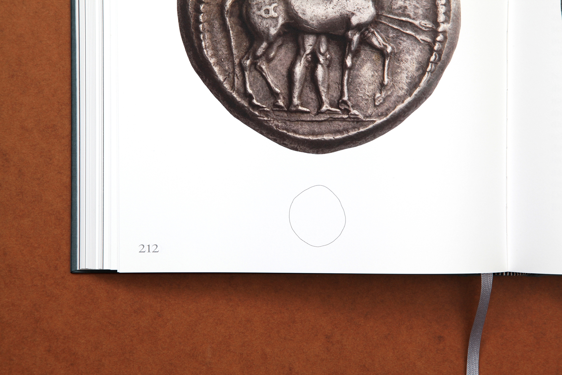 11-bob-design-saager-coin-book-overhead-zoom1-23997.jpg
